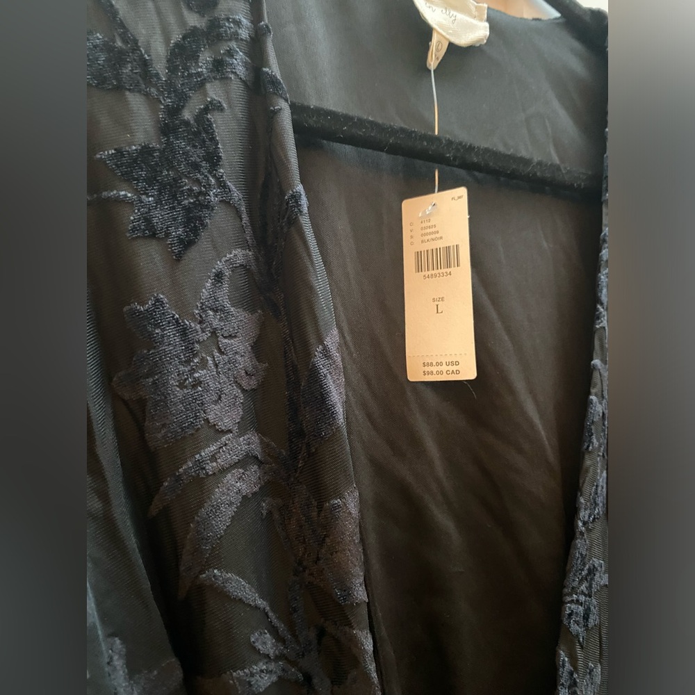 Beautiful Anthropologie blouse .. sheer with velvet , wrap around tie . Size lg